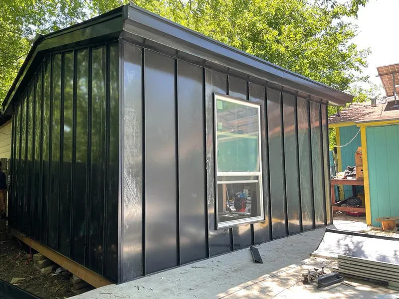 Black standing seam metal wall panels for Roof Inspection in Maricopa