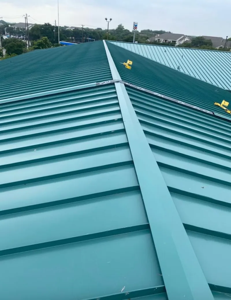 Green commercial metal roof ridge and valley for Metal Roof Repair in Maricopa